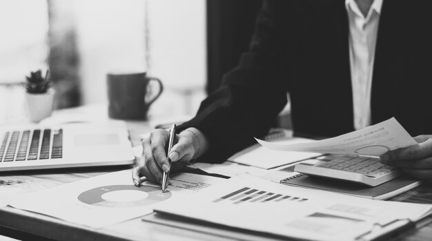 Developer trusts handled by Semper as brokers and introducers review complex property development documents.